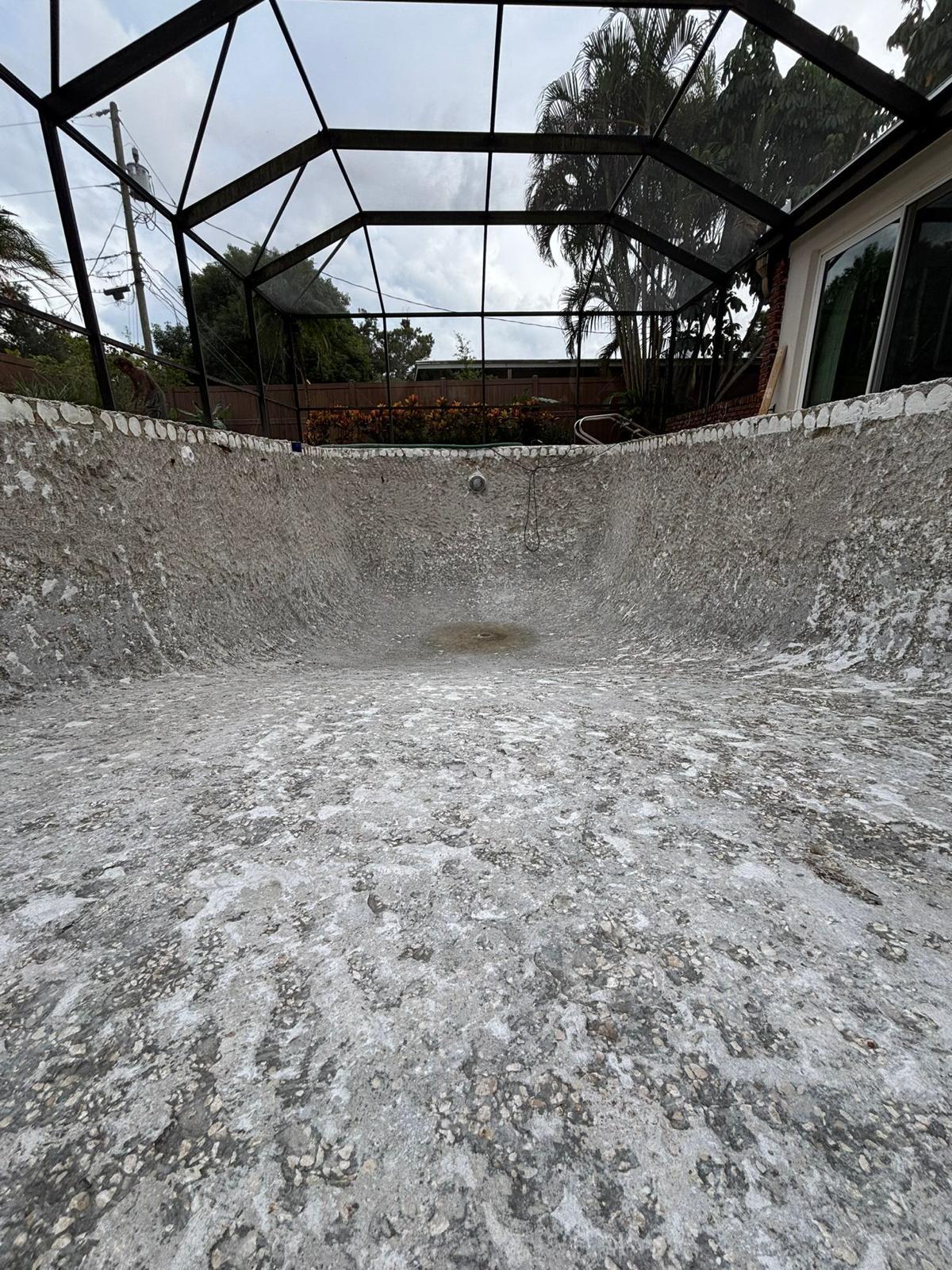 Shotcrete application in progress inside a new pool shell in St. Petersburg